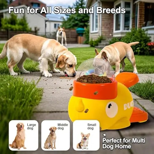 Yellow duck-shaped interactive dog food dispenser and slow feeder on a backyard patio with dogs nearby.