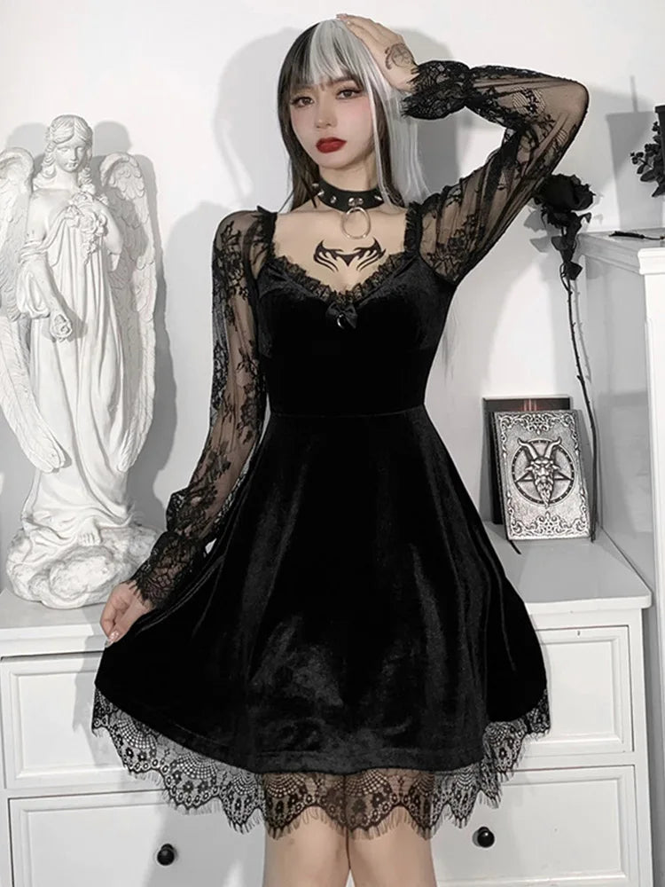 Black velvet A-line mini dress with V-neck, sheer lace sleeves, and lace hem trim.