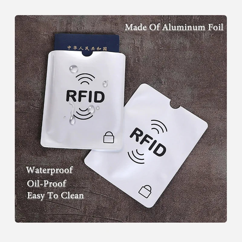 White aluminum foil RFID blocking card sleeves with waterproof, oil-proof surfaces for credit cards.