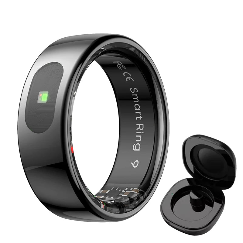 A sleek, glossy black smart health and sleep tracking ring with internal sensors, shown alongside its charging dock.
