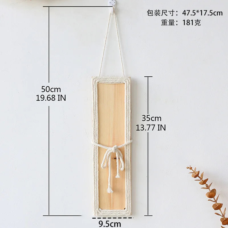 Bohemian rectangular wall decor featuring a natural wood panel wrapped in cream rope with a decorative centre tie.