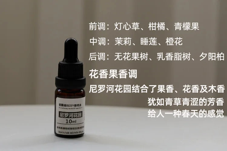 10ml amber glass bottle of essential oil with a black dropper cap, featuring floral, fruity, and woody scent notes.