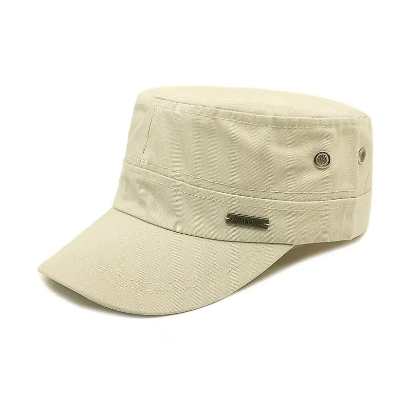 Classic beige military-style flat cap with a structured top, short peak, and side ventilation eyelets.