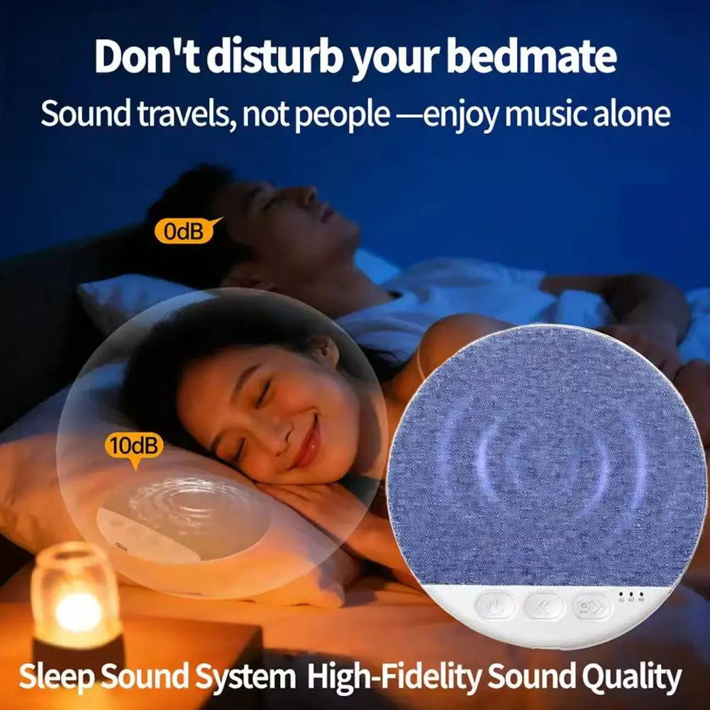 Blue fabric wireless pillow speaker with white control buttons, designed for quiet, high-fidelity sleep listening.