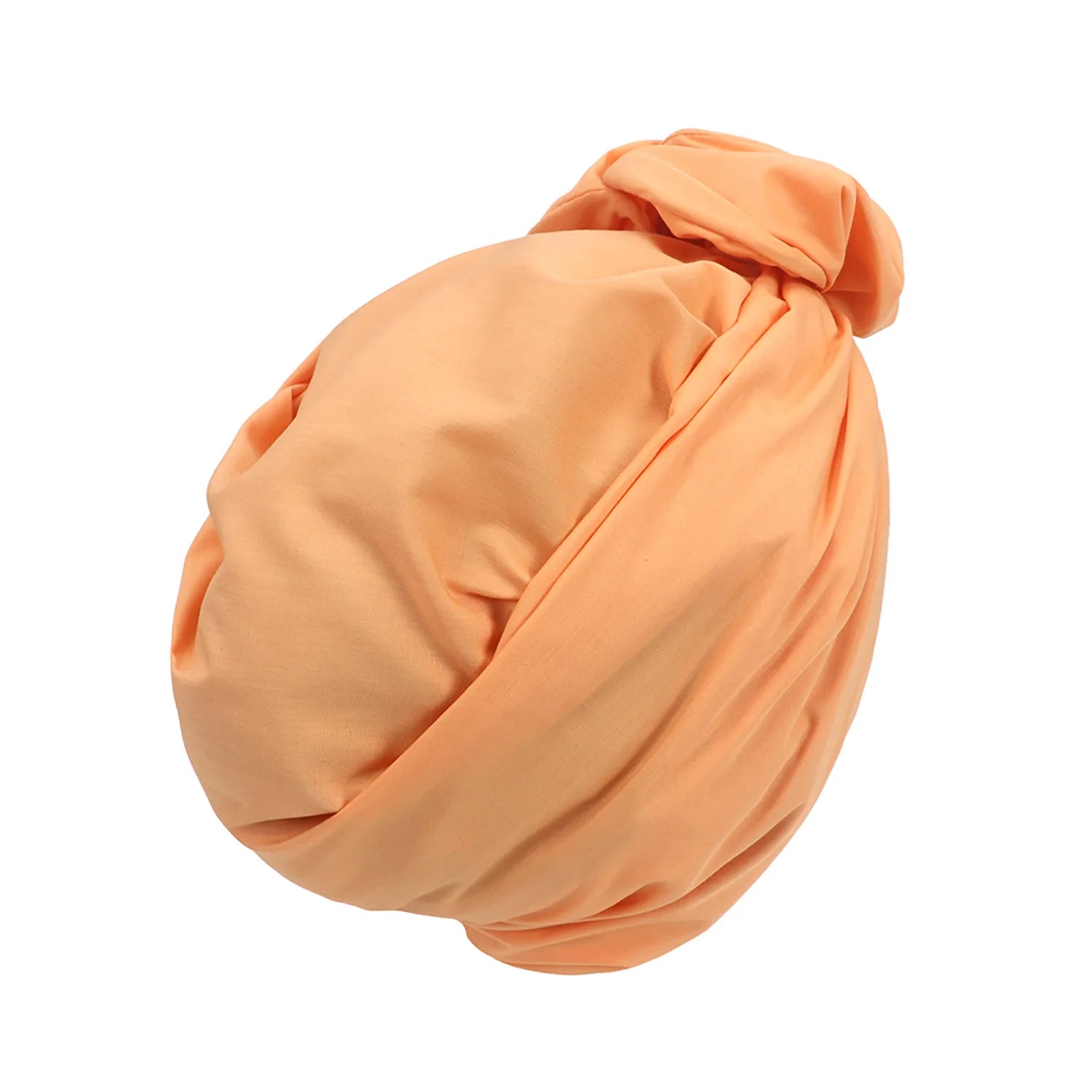 A vintage-style peach turban hat featuring soft fabric folds and a knotted detail at the top.