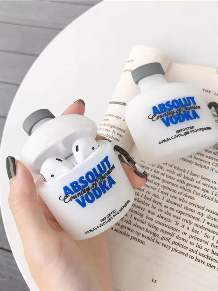 White silicone AirPod case shaped like an Absolut Vodka bottle, compatible with standard AirPods.