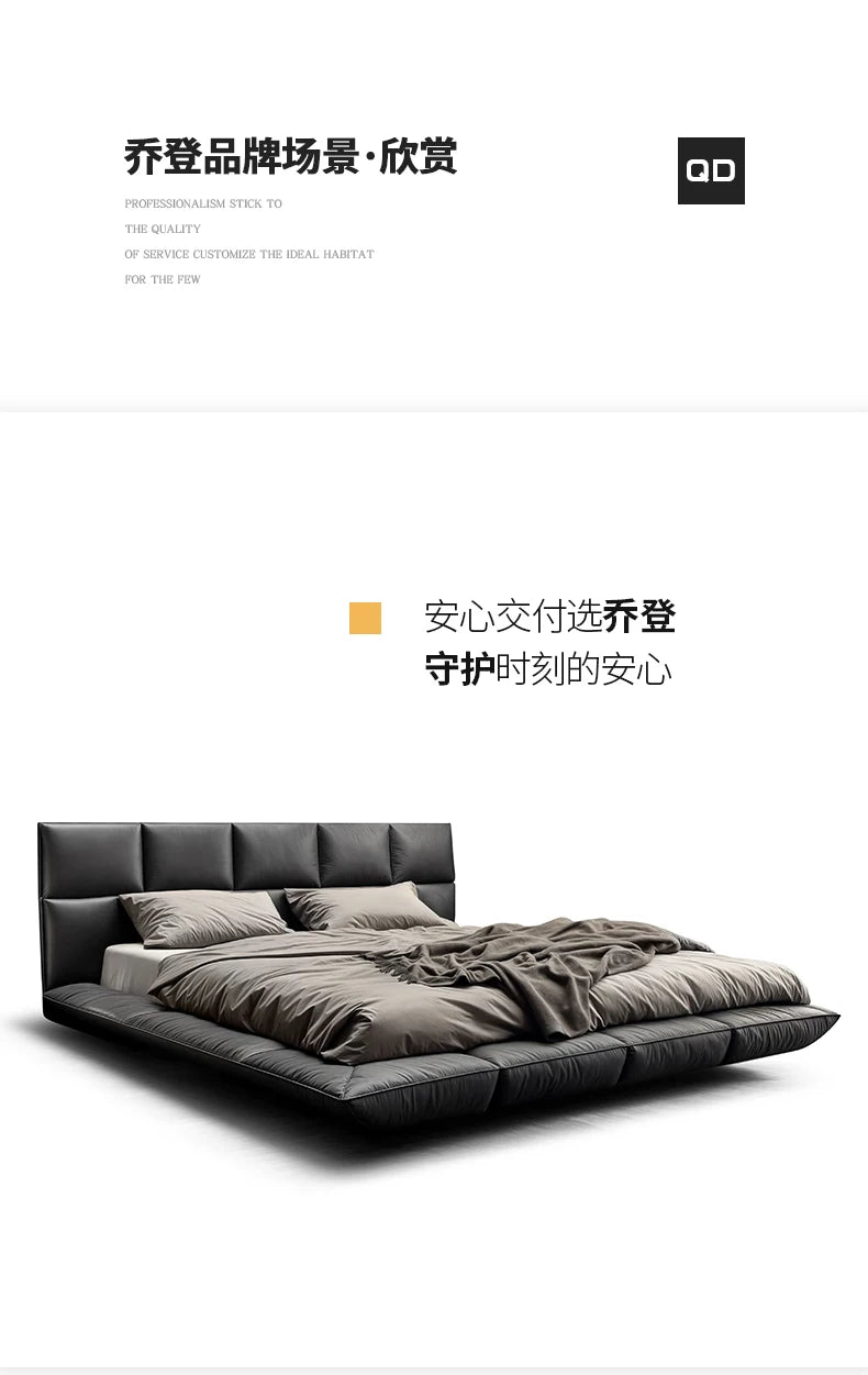 Modern king-size floating bed upholstered in dark grey leather with a cushioned headboard and sleek, low-profile design.