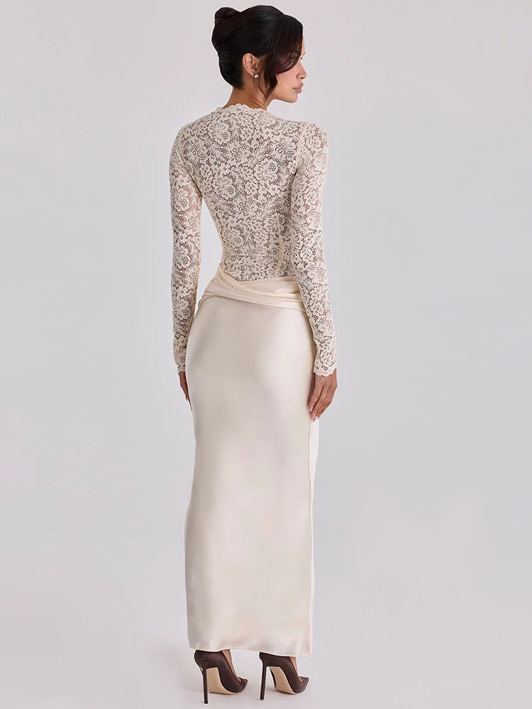 Rear view of a cream long-sleeve maxi dress with lace bodice, satin ruched skirt, and form-fitting mermaid silhouette.