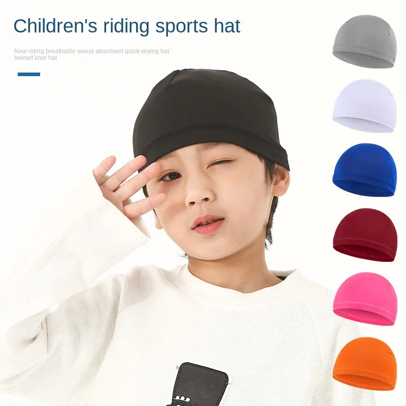 Child wearing a black, quick-drying sports skull cap, with colour options including grey, white, blue, red, pink, orange.