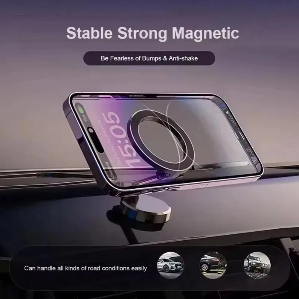 Silver magnetic car phone mount securely holding a smartphone on a dashboard for stable, anti-shake viewing.