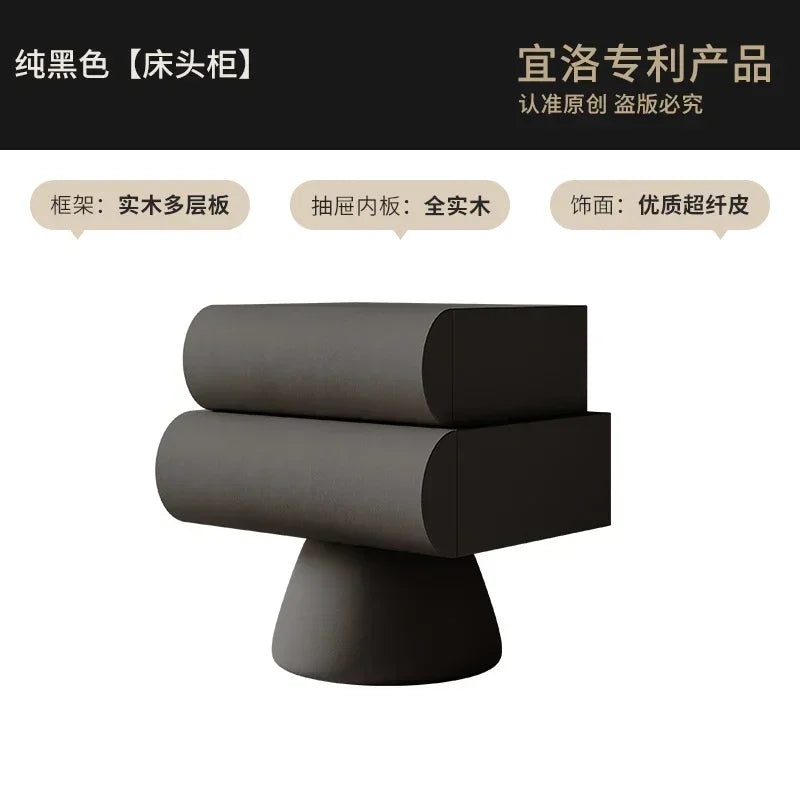Modern black floating bedside table with two rounded drawers and a pedestal-style base for a minimalist look.