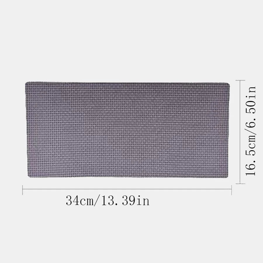 Grey rectangular textured fitness mat, measuring 34cm x 16.5cm, ideal for strength training support.