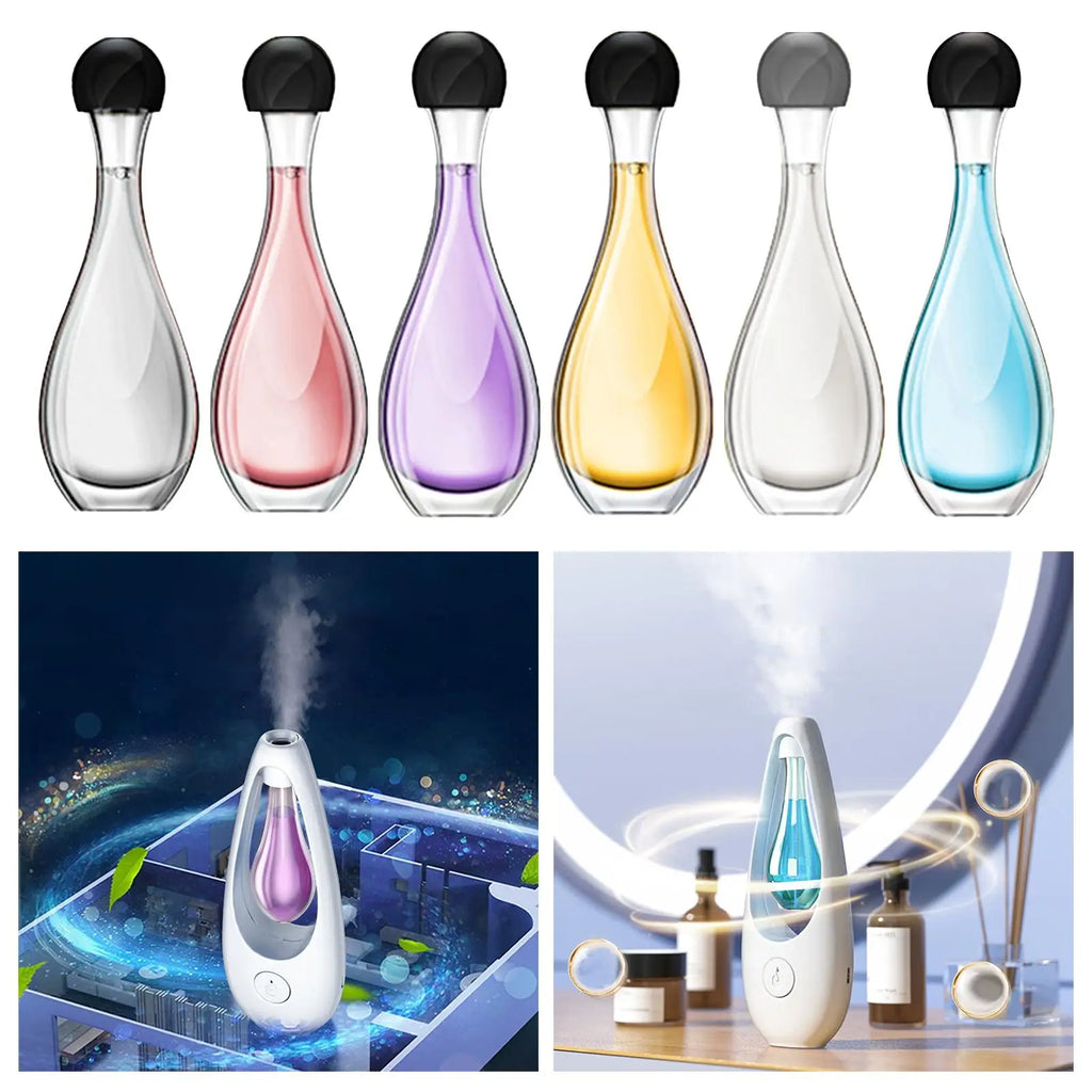 Six teardrop-shaped essential oil diffuser bottles in various colours with white desktop atomiser bases releasing mist.