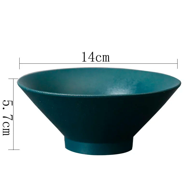 Teal ceramic bowl with a wide, flared rim and sturdy base. Measures 14cm wide and 5.7cm high.
