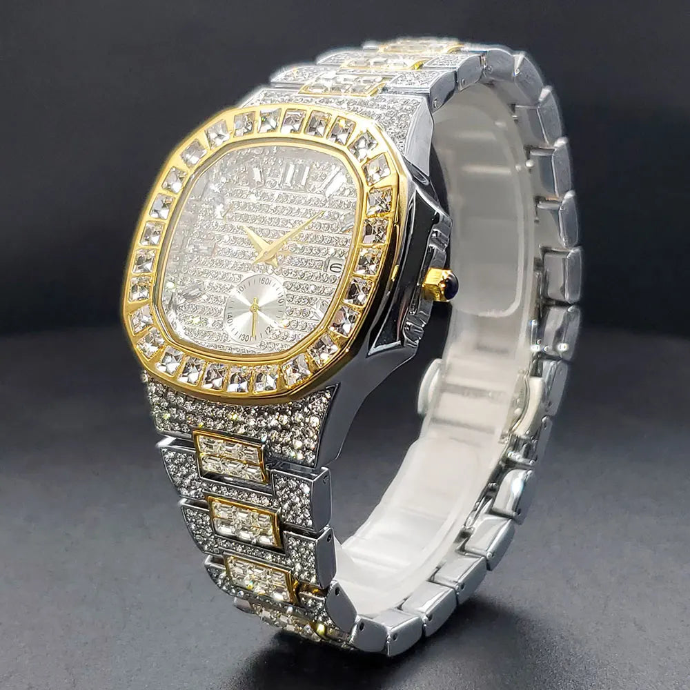 Silver and gold iced-out quartz watch featuring a crystal-paved dial, bezel, and link bracelet with baguette stones.