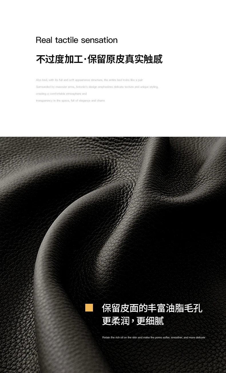 Close-up of premium, soft-textured dark grey leather with visible natural grain and high-quality finish.