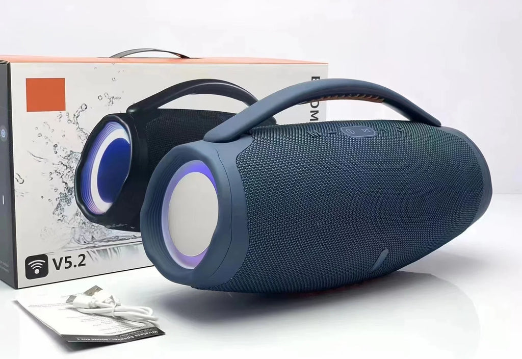 Blue portable 100W waterproof Bluetooth speaker with a carry handle and colourful circular RGB side lighting.