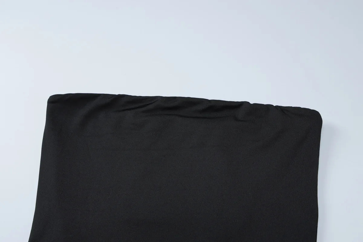 Black strapless tube top made from soft, stretchy fabric, featuring a minimalist design.