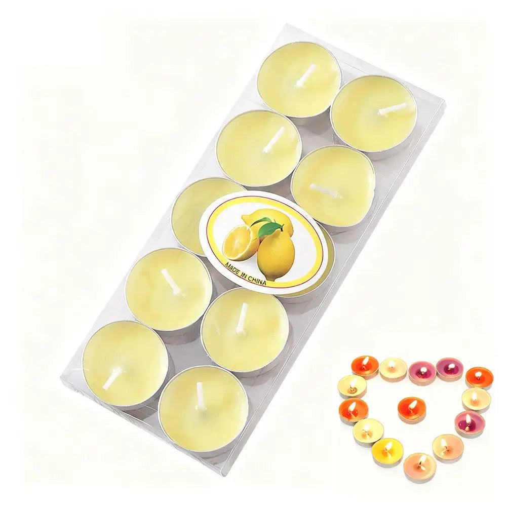 Pack of 10 pale yellow lemon-scented tealight candles in silver tins, next to a heart-shaped arrangement of lit candles.