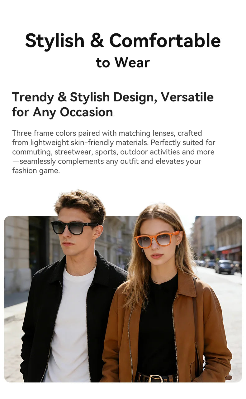 A man and woman wearing stylish smart glasses with black and orange frames and gradient lenses on a city street.