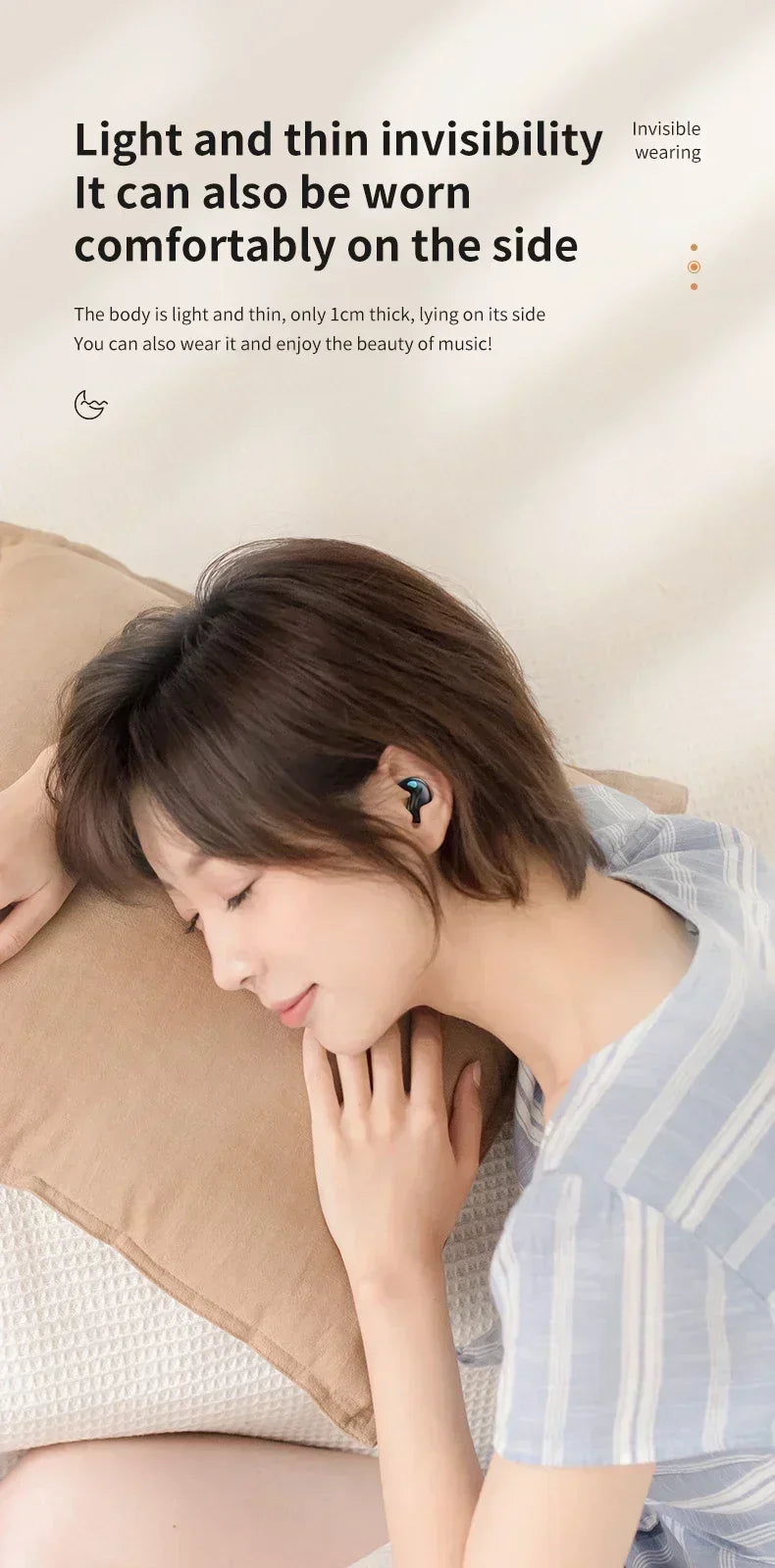 Woman lying on a pillow wearing a small, sleek black earbud designed for comfortable, thin-profile side sleeping.