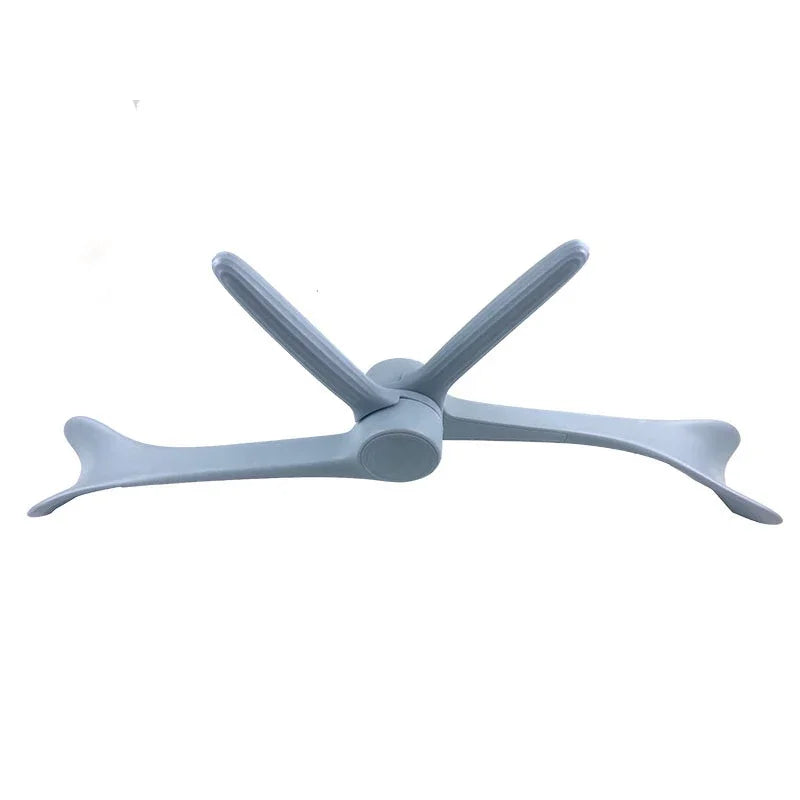 A light blue, multifunctional arm and yoga trainer with a rotating central hub and four contoured exercise arms.