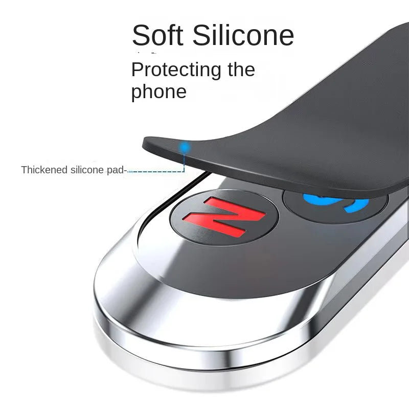 Silver metallic phone mount featuring a flexible black silicone protective pad and red accent detail.