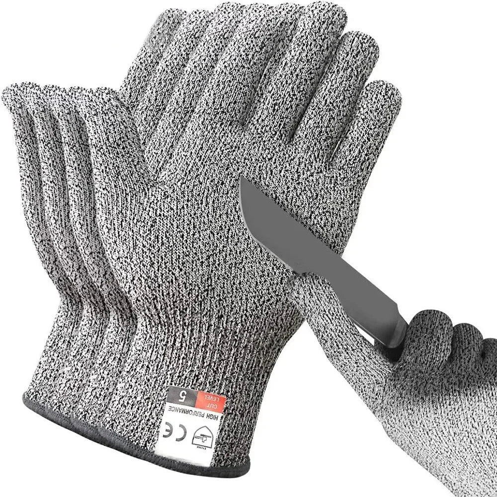 Gray and white speckled HPPE cut-resistant safety gloves with a level 5 label, demonstrated with a knife.