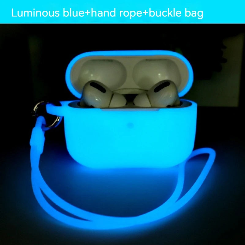 Luminous blue silicone AirPods Pro case with matching carry strap and metal buckle, glowing in the dark.