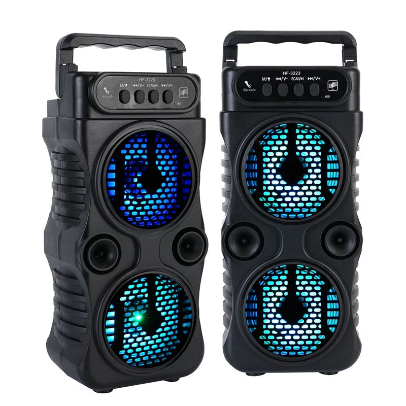 Two portable black wireless speakers with carrying handles and blue LED light-up speaker grilles.