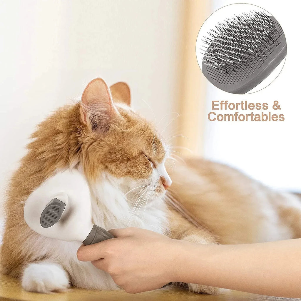 A person uses a white and grey self-cleaning slicker brush to groom a fluffy ginger and white cat.