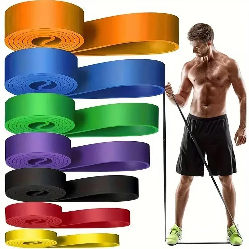A set of seven multi-coloured resistance bands with a man demonstrating an exercise.