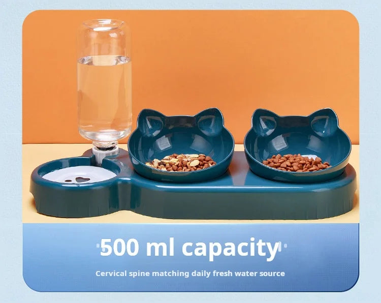 Dark teal 3-in-1 pet feeding station with two cat-shaped bowls and a 500ml gravity water dispenser bottle.