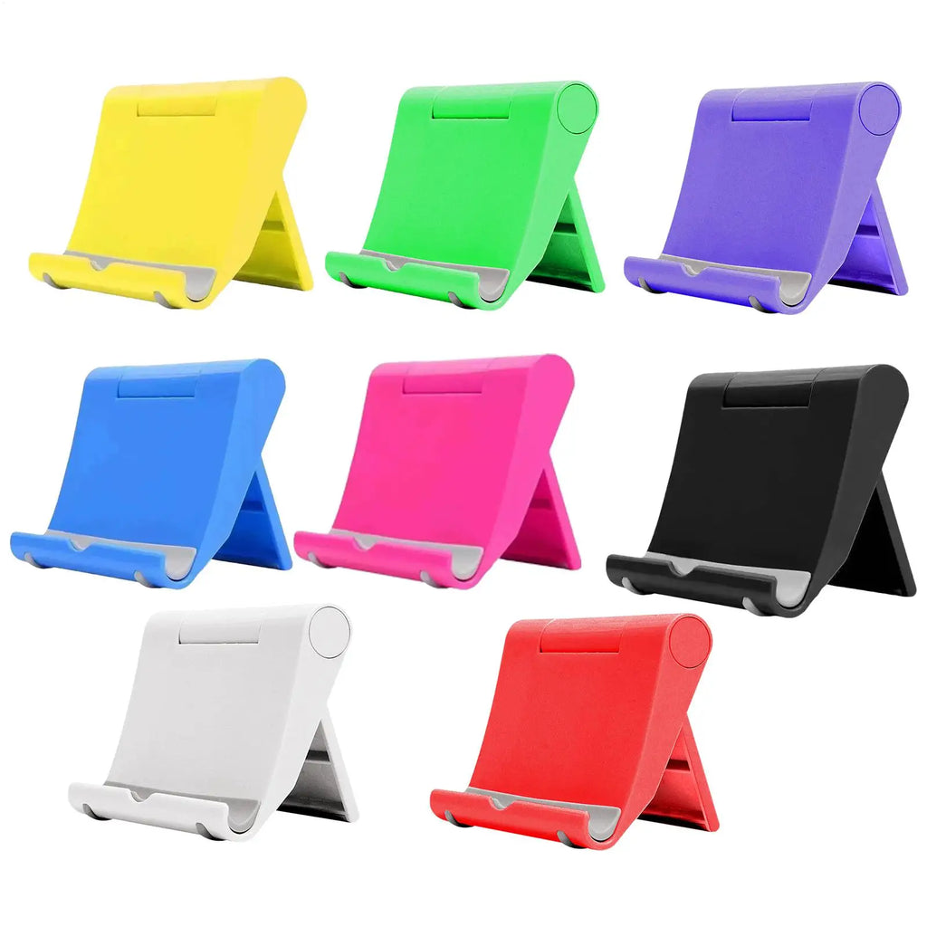 A collection of eight adjustable, foldable phone and tablet stands in various bright colours.