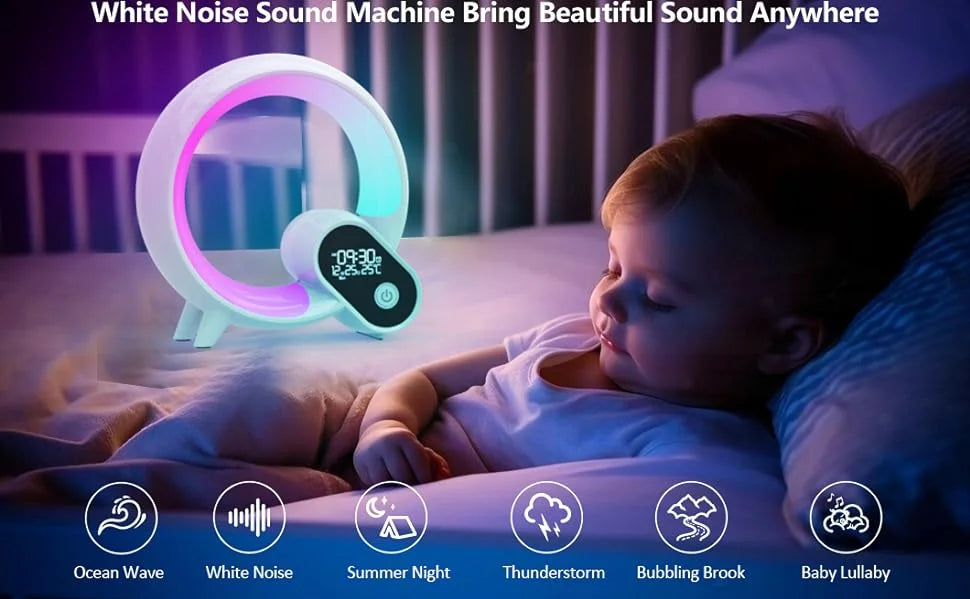 Circular white LED smart alarm clock glowing with ambient pink light next to a sleeping baby.