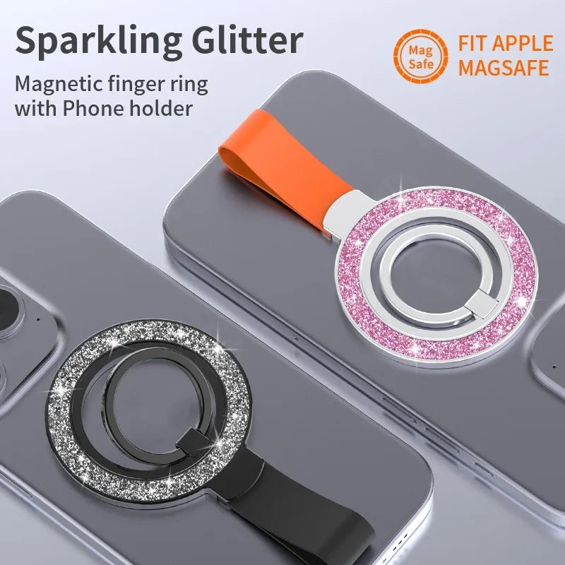 Two magnetic glitter phone rings with finger loops, one in pink/silver and one in black/silver, attached to phones.