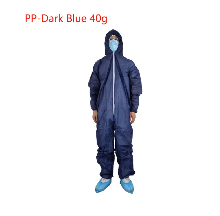 A person wearing a dark blue, 40g hooded protective PP coverall with a front zipper and blue shoe covers.