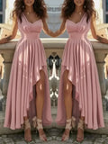 Elegant dusty pink maxi dress with a one-shoulder bodice, cinched waist, and a dramatic high-low ruffled skirt.