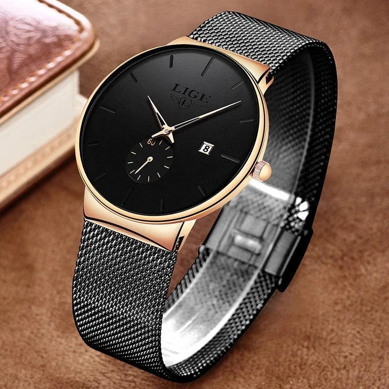 Elegant ultra-thin women’s watch with a black dial, rose gold case, and a textured black stainless steel mesh strap.