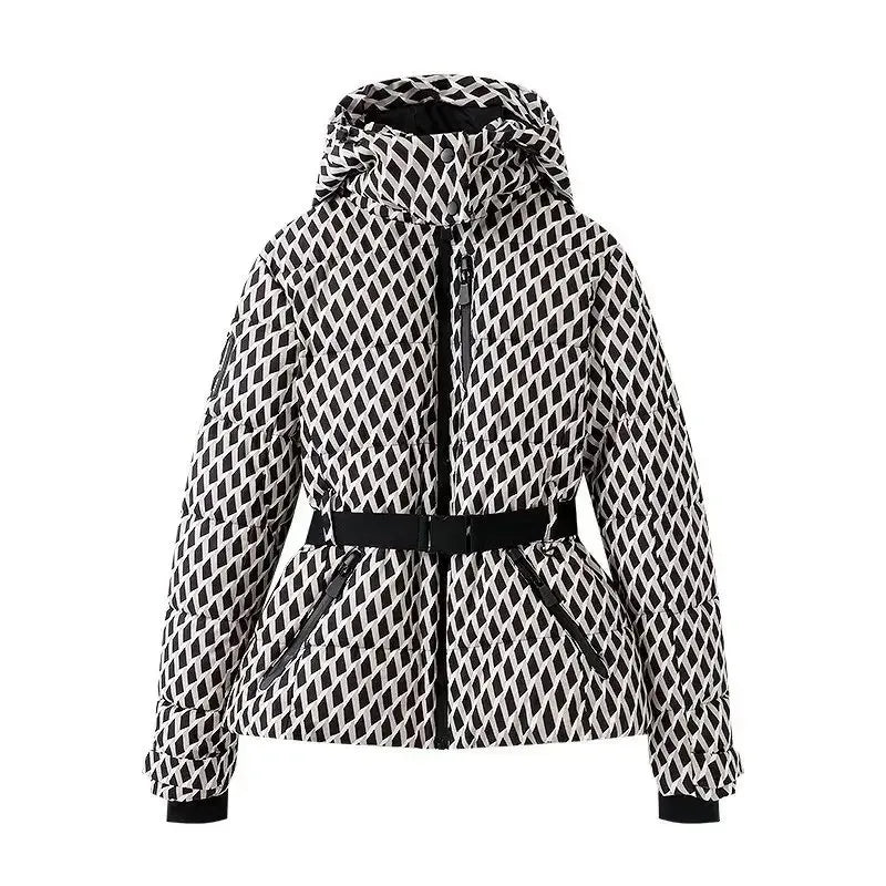 Women's hooded ski jacket in a black and white geometric diamond print with a black belted waist and zip pockets.
