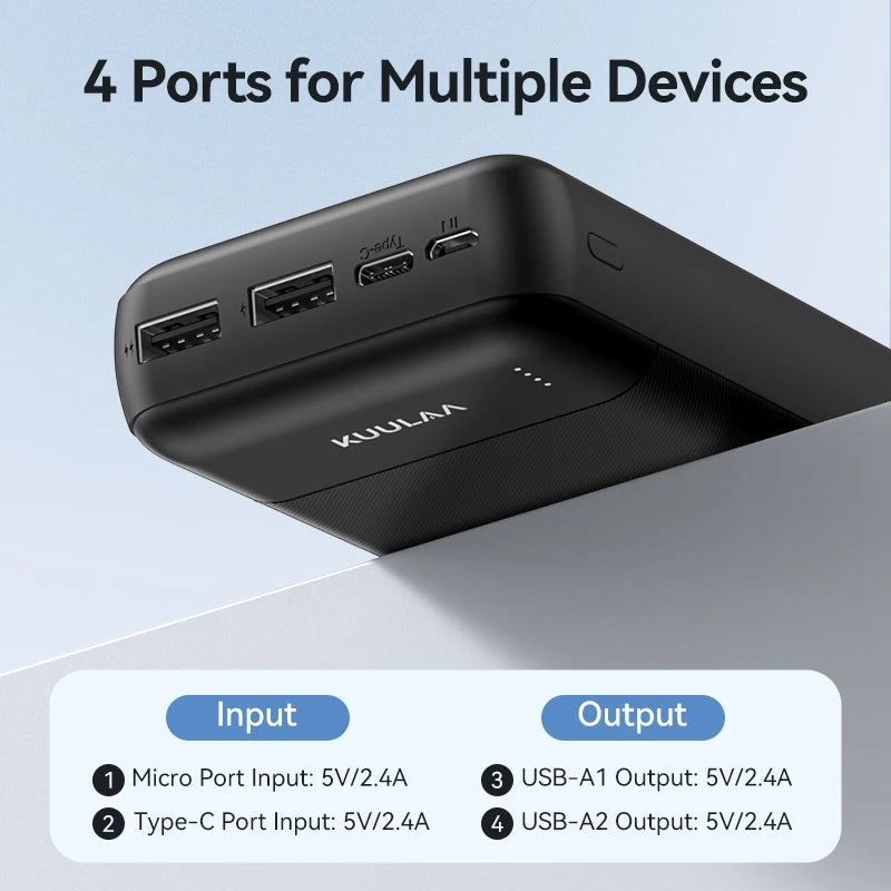 Black 20,000mAh portable power bank with LED status lights and four charging ports for multiple devices.