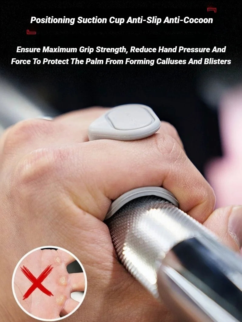 Grey silicone gym grip aid attached to a metal barbell, showing it held in a hand to prevent calluses.