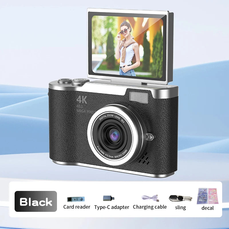 Black digital 4K camera with a textured body, 18x zoom lens, and a flip-up screen, including various accessories.