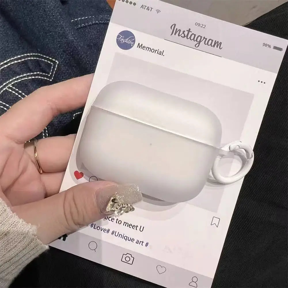 White silicone AirPods Pro case with ring attachment, presented on a social media-themed display card.