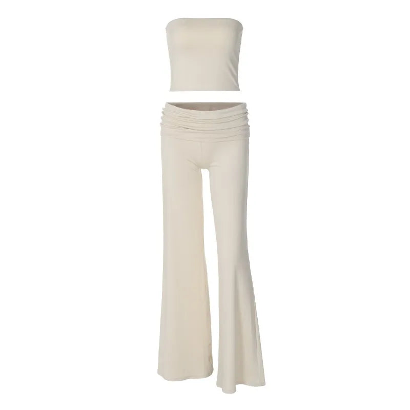 Cream-coloured two-piece set featuring a strapless bandeau crop top and high-waisted wide-leg trousers.