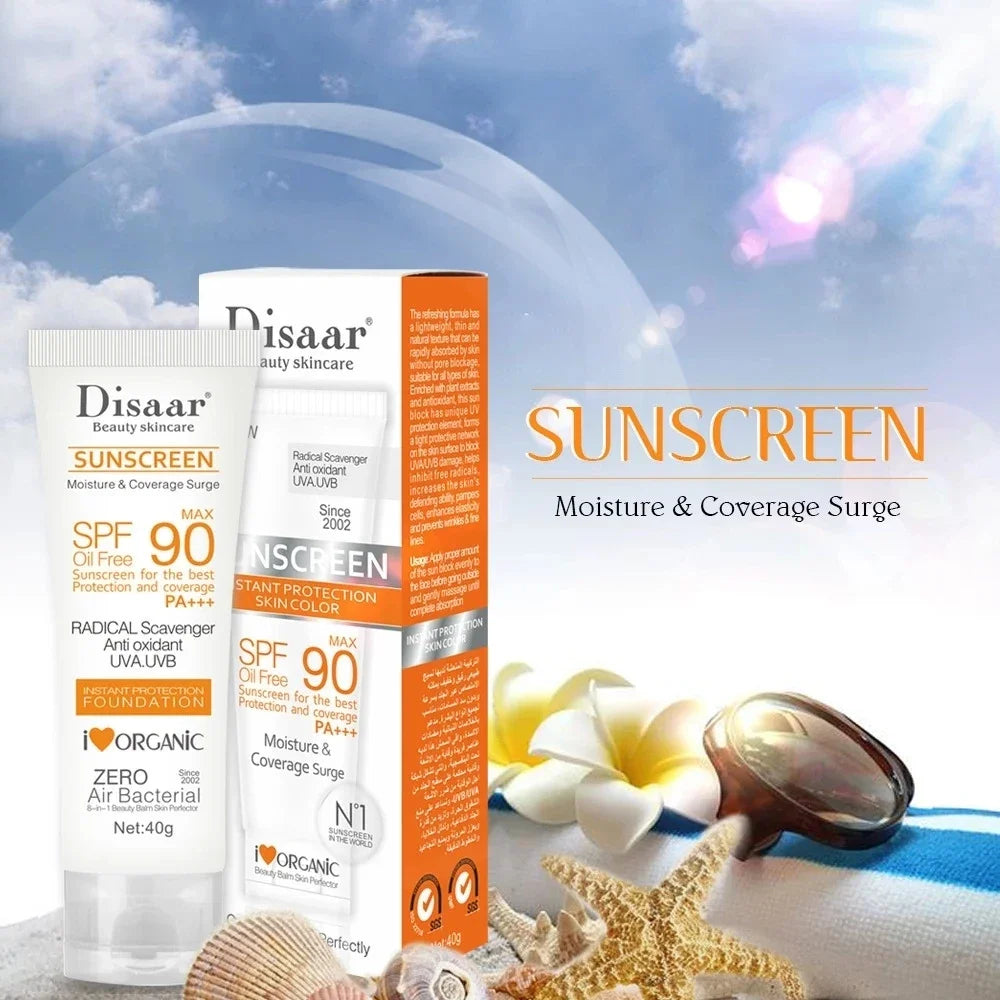 SPF 90 oil-free sunscreen tube and box with moisture and coverage benefits, set on a beach background with a starfish.