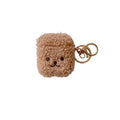 Beige fluffy teddy bear AirPods case with gold keyring attachment. Suitable for standard AirPods models.