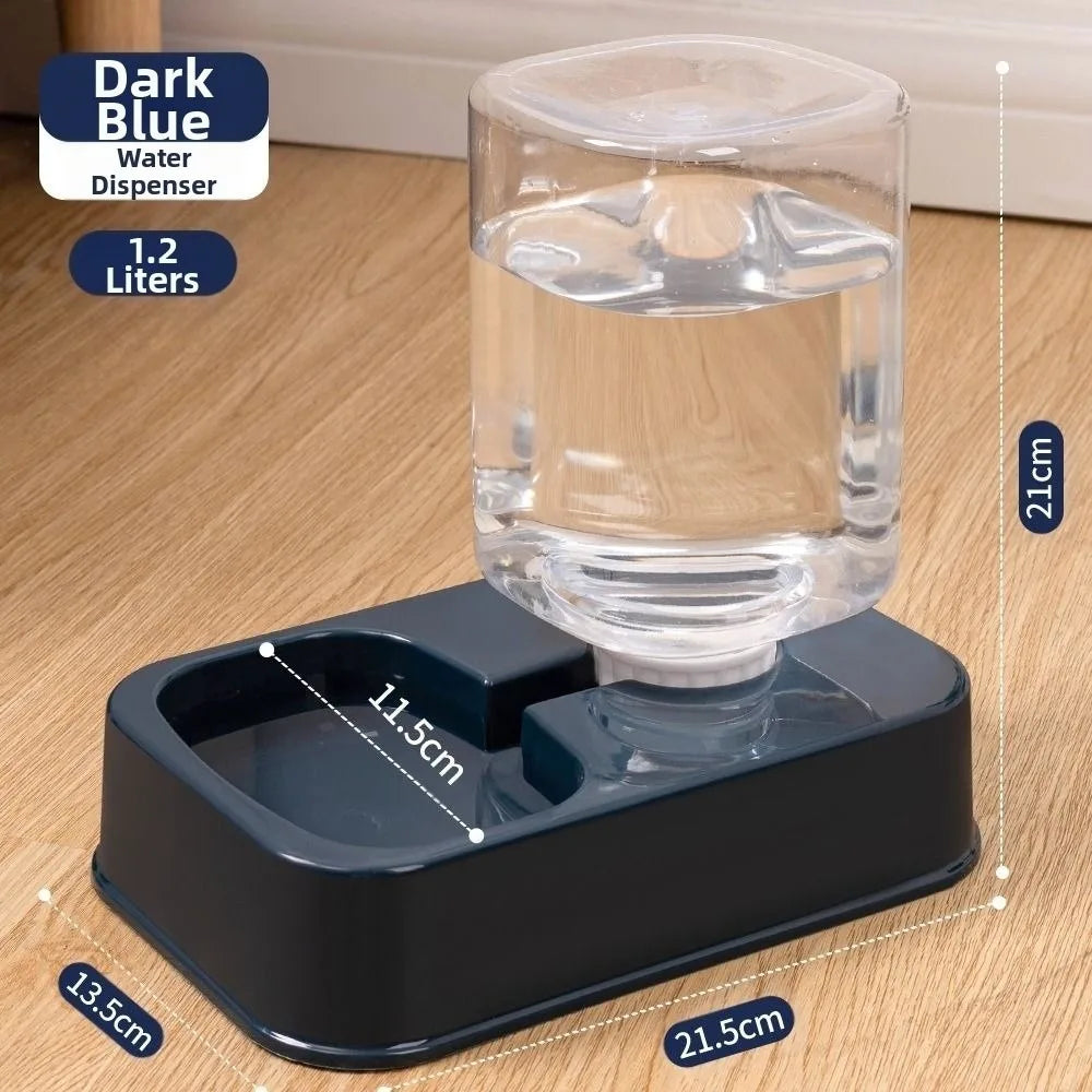 Dark blue 1.2-liter pet water dispenser with a clear rectangular tank and matching base on a wooden floor.