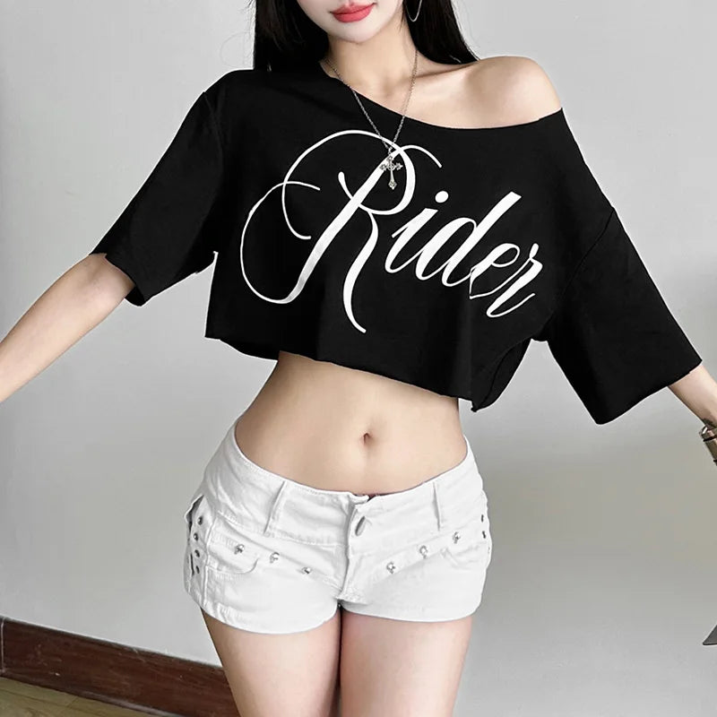 Black oversized crop t-shirt with short sleeves, off-shoulder skew collar, and white "Rider" letter print.