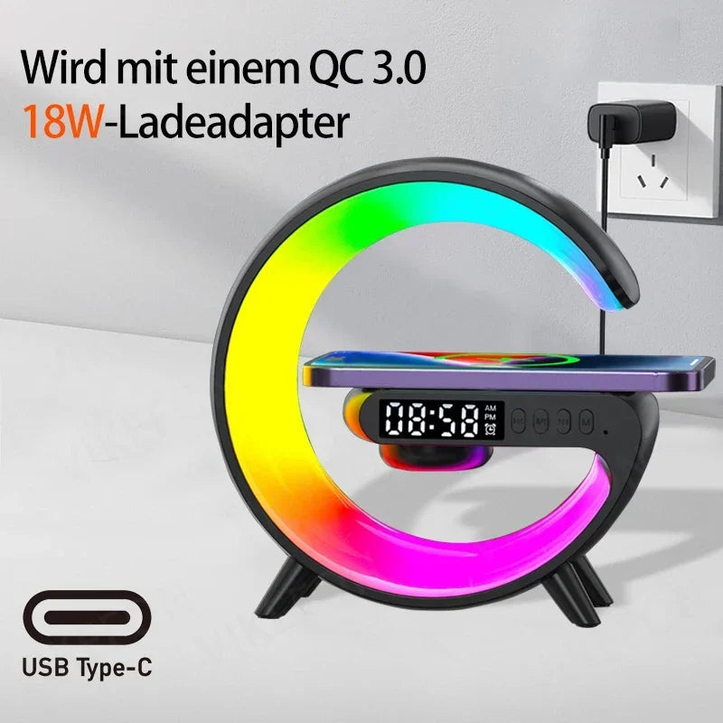 Black G-shaped Bluetooth speaker with vibrant RGB LED light, integrated digital clock, and wireless phone charger.